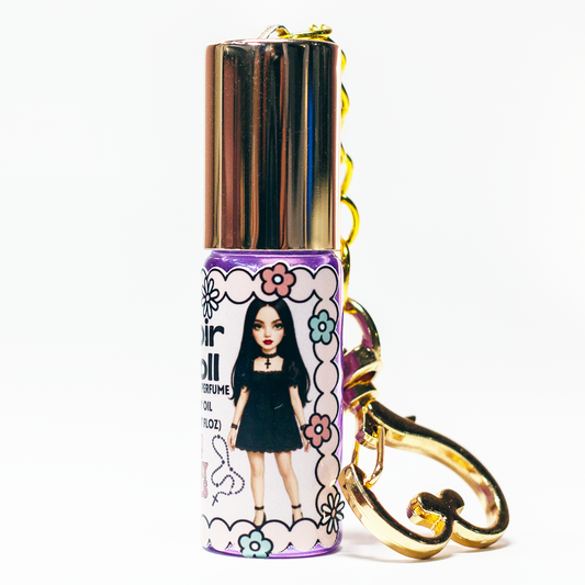 Noir Doll dark floral perfume oil roll-on, 5 ml glass bottle with gold heart keychain clasp – The Valley Dolls fragrance