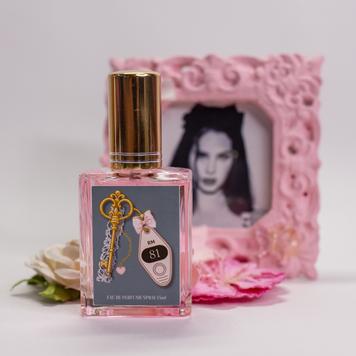 Room 81 Eau de Parfum spray bottle 15ml styled with pink frame and floral accents seductive signature fragrance by The Valley Dolls