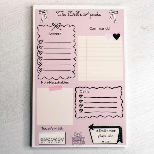 The Daily Agenda - A Doll Never Plans, She Plots