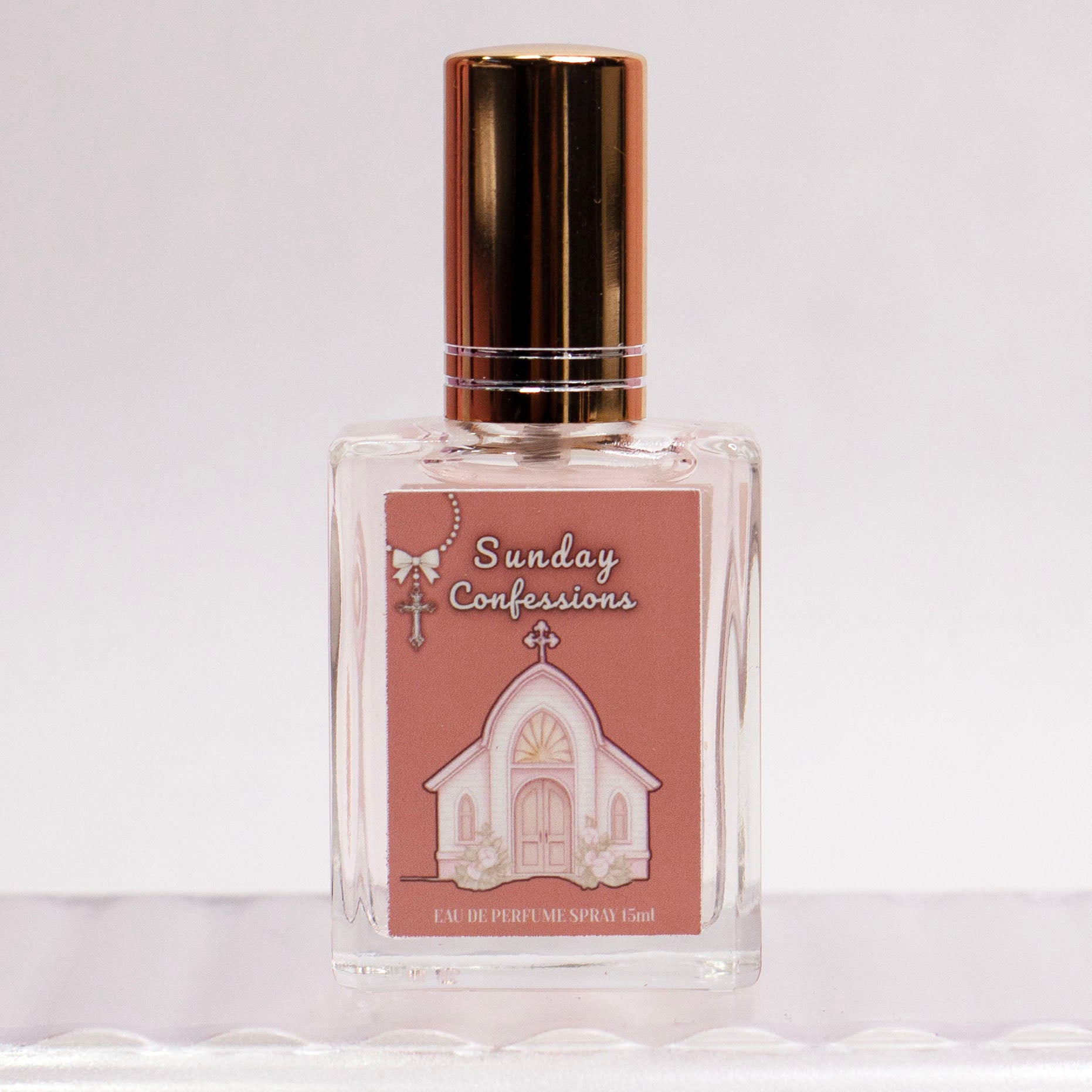Sunday Confessions by The Valley Dolls, a Korean-inspired skin scent perfume spray in a clear glass bottle.
